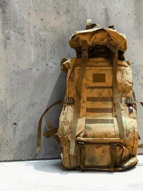 Men's Tactical 70L military-style MOLLE rucksack.